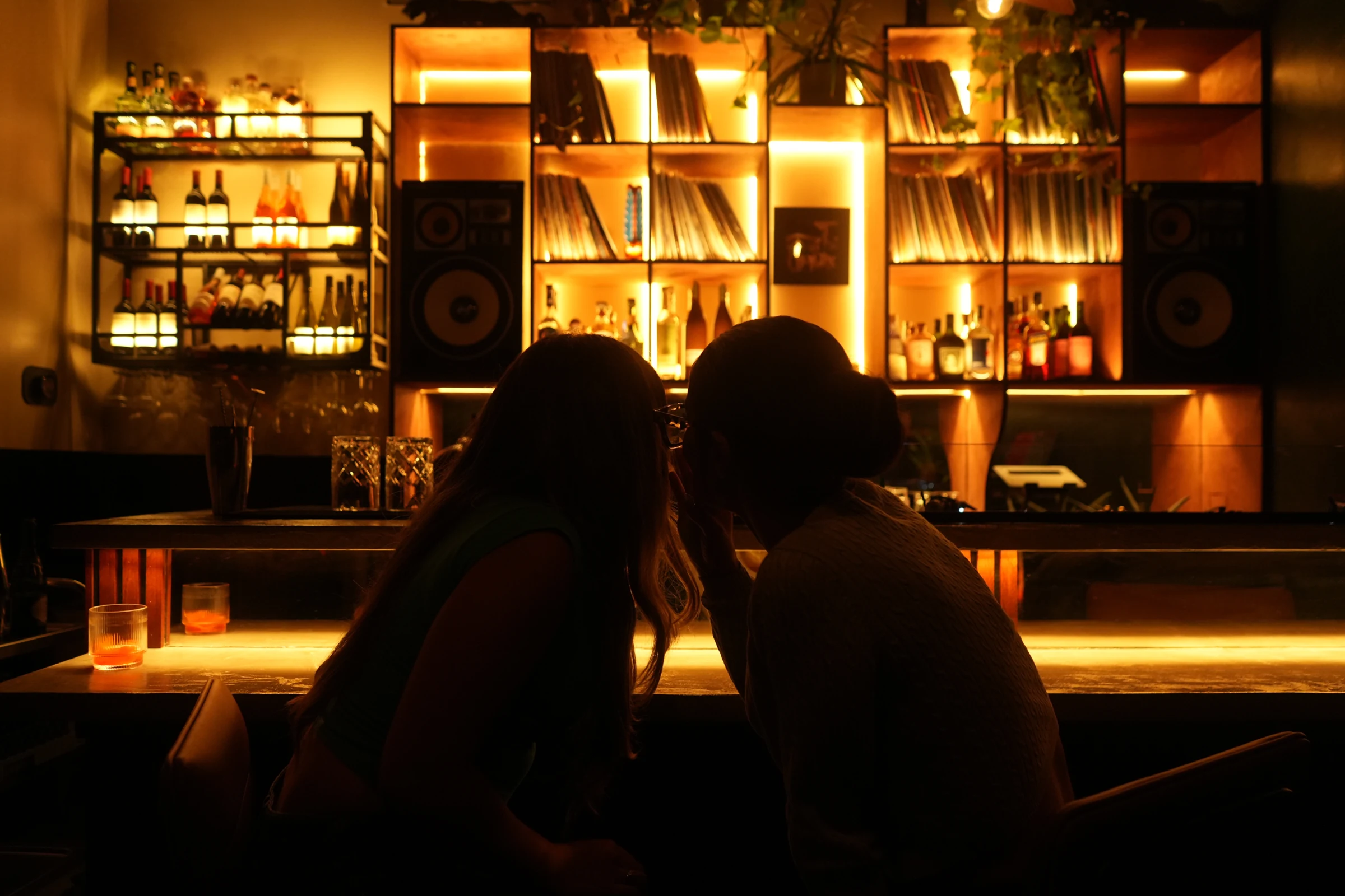 The softly lit bar and record shelves at The Felix